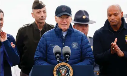  ?? Photograph: Julia Nikhinson/AP ?? President Biden speaks alongside Maryland governor Wes Moore (right, clapping), on 5 April 2024 in Dundalk, Maryland.