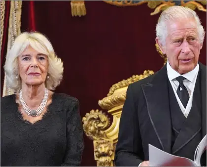  ?? ?? DIGNIFIED: King Charles and Camilla at St James’s Palace, where he was formally named as monarch