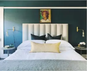  ?? MURRAY MARY COSTA/CAITLIN ?? A bedroom designed by Caitlin Murray of Black Lacquer Design. Murray hunts for vintage portraits at flea markets and uses them to unite the colours in a room.