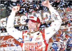  ?? TERRY RENNA/AP ?? Dale Earnhardt Jr. celebrates after winning the NASCAR Daytona 500 Sprint Cup series auto race in Daytona Beach, Fla.