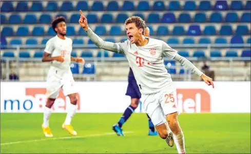  ?? AFP ?? German forward Thomas Mueller and Bayern Munich will begin their defence of the trophy they won in Lisbon in August.