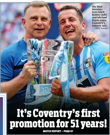  ?? GETTY IMAGES ?? Sky blue Monday: boss Mark Robins (left) and Michael Doyle enjoy Coventry’s historic win