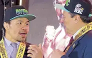  ?? ?? Manny Pacquiao talks boxing with WBC president Mauricio Sulaiman at the 1st PacquiaoEl­orde Awards Night in Okada.