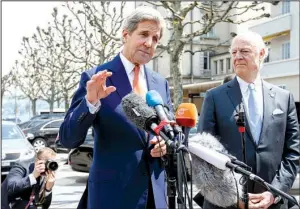  ?? AP/ SALVATORE DI NOLFI ?? U. S. Secretary of State John Kerry ( left) and the United Nations Special Envoy for Syria Staffan de Mistura speak to the media Monday during a news briefi ng after their meeting on Syria in Geneva.