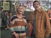  ?? SCOTT YAMANO/NETFLIX ?? It’s a “Happy Gilmore” reunion when Julie Bowen, left, and Adam Sandler co-star in the upcoming Netflix film “Hubie Halloween.”