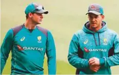  ?? Courtesy: ICC twitter ?? Tim Paine (right) with deposed skipper Steve Smith.