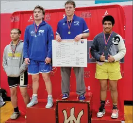  ?? PHOTO SPECIAL TO THE O-N-E ?? Bunker Hill wrestler Adrian Cruz (far right) secured a 3rd place finish in the 190 pound class during the NCHSAA 2A West Regionals at West Lincoln High School on Saturday, Feb. 10.