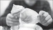  ??  ?? A child is eating a cupcake that contains high unhealthy calories.(Photo: EPA)