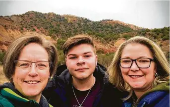  ?? Courtesy Tracey Sullivan ?? Tracey Sullivan, left, Kaden Senter and Sgt. Kaila Sullivan are shown in a family photograph. The officer was killed during a traffic stop in December 2019.
