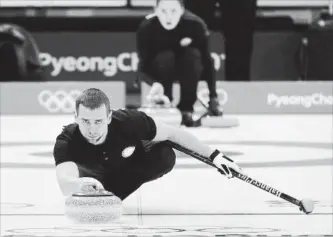  ?? AARON FAVILA THE ASSOCIATED PRESS ?? Russian curler Alexander Krushelnit­sky was stripped of his Olympic bronze medal after admitting to a doping violation. Rumours are he was using a corked broom, too.