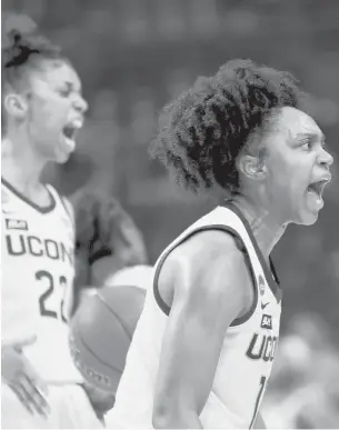  ?? CARMEN MANDATO/GETTY ?? UConn’s Christyn Williams reacts following a basket against Iowa Hawkeyes during the second half in the Sweet 16 of the NCAA Tournament on Saturday at the Alamodome in San Antonio.