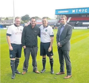  ??  ?? From left: Macclesfie­ld Town assistant manager Steve Watson, Axon managing director Tim Mears, Macclesfie­ld Town manager John Askey and general manager Rob Heys