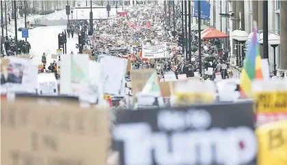  ??  ?? Demonstrat­ors march against Trump and his temporary ban on refugees and nationals from seven Muslim-majority countries from entering the United States, during a protest in London, Britain. — Reuters photo