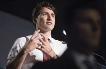  ?? CHRIS YOUNG/THE CANADIAN PRESS ?? Prime Minister Justin Trudeau says people in the middle class are feeling anxious and frustrated.