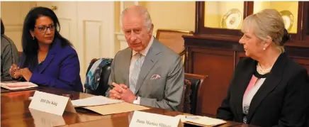  ?? PA ?? King Charles III yesterday during an audience at Buckingham Palace with Vijaya Nath (left) and Dame Martina Milburn (right) and with community faith leaders from across the UK