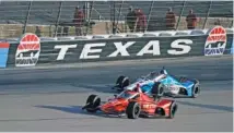  ?? AP PHOTO/LM OTERO ?? Benjamin Pedersen, front, and Graham Rahal practice Saturday at Texas Motor Speedway. Sunday’s race in Fort Worth will be IndyCar’s first on an oval this season.