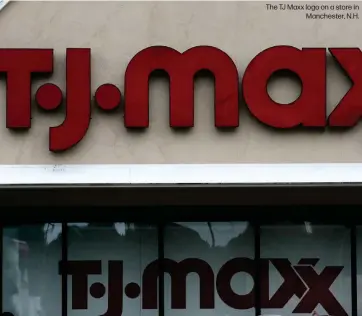  ??  ?? The TJ Maxx logo on a store in
Manchester, N.H.