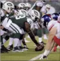  ?? JULIO CORTEZ - THE ASSOCIATED PRESS ?? FILE - In this Aug. 24, 2018, file photo, New York Jets center Jonotthan Harrison (78) prepares to snap the ball.