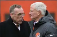  ?? THE ASSOCIATED PRESS FILE ?? Browns General Manaager John Dorsey, left, talks with owner Jimmy Haslam. In a radio interview, Dorsey said that ownership has indicated it wants coach Hue Jackson to return.