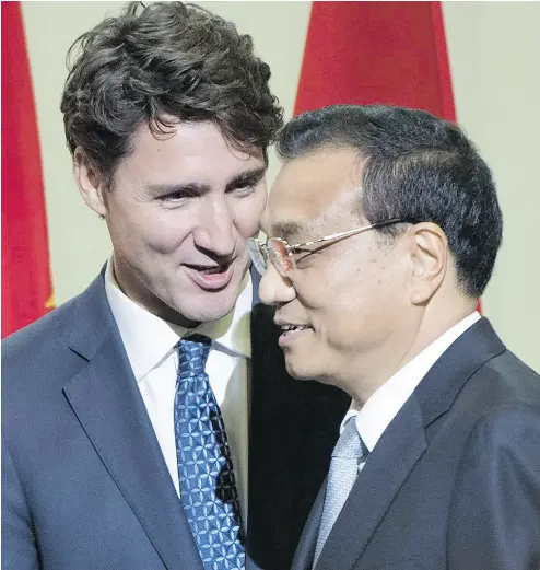  ?? RYAN REMIORZ / THE CANADIAN PRESS FILES ?? Prime Minister Justin Trudeau introduces Chinese Premier Li Keqiang at a luncheon in Montreal in 2016.