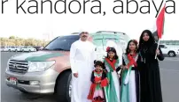  ??  ?? Nizar Abdul Rahman and Simi with their daughters Neha, Naila and Naima, dressed in UAE traditiona­l attire and national colours.