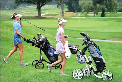  ?? Photos by Ernest A. Brown ?? Kirkbrae Country Club’s Kylie Eaton, top right, beat younger sister Adriana, top left, 2-up in Thursday morning’s RIGA Junior Amateur semifinal at Rhode Island College. Cumberland’s Max Jackson is also reached this morning’s final with an upset win over top-seeded Bennett Masterson.