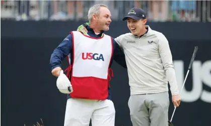  ?? ?? Billy Foster and Matt Fitzpatric­k drink in the moment on the 18th as Fitzpatric­k’s US Open victory was confirmed. Photograph: Rob Carr/ Getty Images