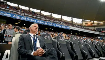  ?? PHOTO: GETTY IMAGES ?? Sydney FC coach Graham Arnold sits on his own as he awaits the start of the 2017 A-League grand final.