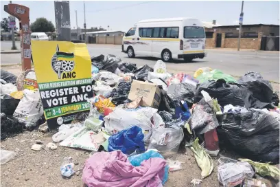  ?? Picture: Nigel Sibanda ?? DUMPSITE. Piles of waste lie along a street after contractor Waste Partners suspended its services last month due to nonpayment by the City of Ekurhuleni.