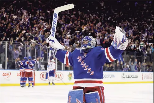  ?? Bruce Bennett / Getty Images ?? Rangers’ goalie Henrik Lundqvist celebrates an empty net goal against the Canadiens during the third period in Game 6 of the Eastern Conference First Round on April 22, 2017. Lundqvist announced his retirement Friday, less than nine months after heart surgery.