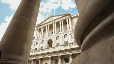  ??  ?? Hawkish stance: The BoE building in the City of London. The stronger data flow could prompt the BoE to maintain a hawkish signal at its policy meeting today. — Bloomberg