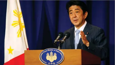  ??  ?? SHINZO ABE, Japan’s prime minister gestures during a news conference at a hotel in Manila, Philippine­s on Saturday.
