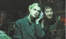  ?? A24 ?? Elle Fanning as an alien in “How to Talk to Girls at Parties,” with Alex Sharp.