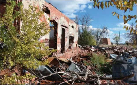  ?? ?? The ruins of a building that was part of a Native American boarding school on the Rosebud Sioux Reservatio­n in Mission, S.D., are seen Oct. 15. Former students described mistreatme­nt they received at the school during a “Road to Healing” event led by U.S. Interior Secretary Deb Haaland.