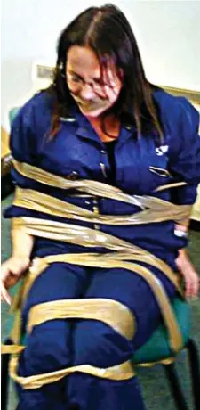  ??  ?? Ordeal: DeeAnn Fitzpatric­k was taped to a chair