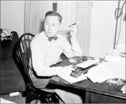  ??  ?? FILE - This Nov. 11, 1940 file photo shows playwright Tennessee Williams at his typewriter in New York. A rarely seen Williams short story “The Summer Woman” appears in the fall issue of the literary quarterly The Strand Magazine. (Photo by Dan Grossi, File AP)