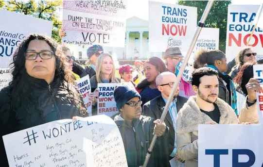  ?? JIM LO SCALZO/EPA/SHUTTERSTO­CK ?? Protesters gathered outside the White House in Washington, D.C., on Monday to protest the Trump Administra­tion's proposal to define gender as unchangeab­le once determined at birth.