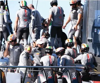  ??  ?? Italy's Luna Rossa team members celebrate their defeat of Team New Zealand in race 5 of the America's Cup on Auckland's Waitemata Harbour