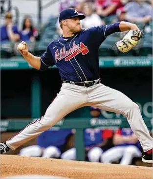  ?? LM OTERO/ASSOCIATED PRESS ?? Braves starting pitcher Bryce Elder, before a cheering throng of hometown friends and family, starts the first inning Saturday against the Rangers in Arlington, Texas.