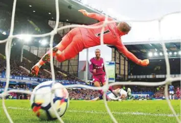  ?? Reuters ?? Manchester City’s Raheem Sterling scores the third goal against Everton during their Premier League match at Goodison Park on Saturday.