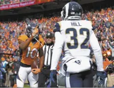  ?? AP file photos ?? Denver wide receiver Emmanuel Sanders, shown taunting Rams cornerback Troy Hill during a game in October, will be with the Broncos as they open training camp.