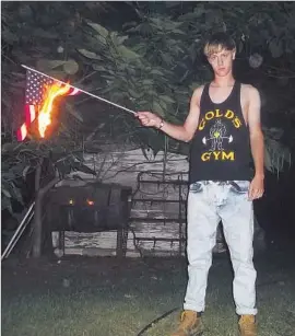  ??  ?? A PHOTO from what appears to be Dylann Roof’s website. The Trayvon Martin killing apparently fueled an obsession with the Confederac­y and racial issues.