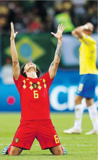  ?? MATTHIAS SCHRADER/THE ASSOCIATED PRESS ?? Axel Witsel celebrates at the final whistle as Belgium beat Brazil 2-1 in their quarter-final in Kazan, Russia on Friday to reach the World Cup semis for the first time since 1986.