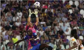  ?? ?? One of the best goalkeeper­s in the world, Lyon’s Christiane Endler, jumps to catch the ball against Barcelona during the Champions League final. Photograph: Alessandra Tarantino/ AP