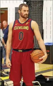  ?? TIM PHILLIS — THE NEWS-HERALD ?? Kevin Love, shown on Cavaliers media day on Sept. 25, will be the starting center to begin the season.