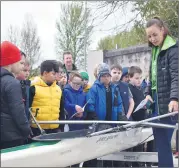  ?? (Photo: Katie Glavin) ?? Olympian, Aifric Keogh teaching pupils of Bishop Murphy Memorial School about rowing boats at Fermoy Rowing Club.