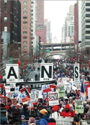  ?? SHAWN BALDWIN / ASSOCIATED PRESS ?? Anti-war protesters gather near United Nations headquarte­rs in New York