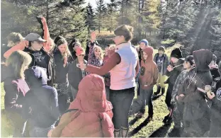  ?? ANNE WARBURTON ?? Perfect fall weather, curious young minds and teachers who care: my walk in the woods with this group of students from Musquodobo­it Valley Education Centre was just what I needed.