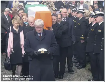  ??  ?? PROCESSION Dara’s coffin is carried into the Dublin church