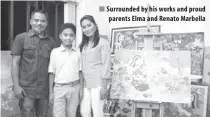  ??  ?? Surrounded by his works and proud
parents Elma and Renato Marbella